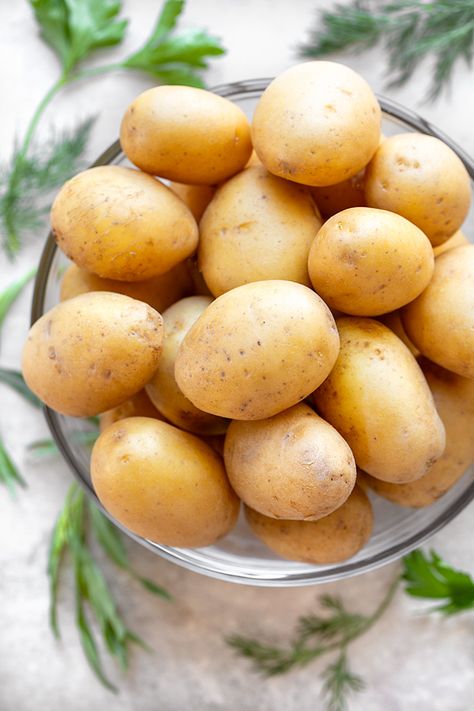 Baby yellow potatoes are the star in this savory French potato salad with fresh herbs and shallots dressed in a mustard vinaigrette! | thecozyapron.com #frenchpotatosalad #frenchpotatosaladrecipe #frenchpotatosaladwithtarragon #frenchpotatosaladdressing #frenchpotatosaladnomayo Baby Yellow Potatoes, Potato Salad No Mayo, Salad With Fresh Herbs, Deli Style Sandwiches, French Potato Salad, Loaded Baked Potato Salad, French Potatoes, Baked Potato Salad, Mustard Vinaigrette