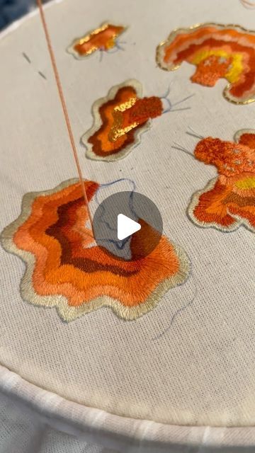 Freya Stanford on Instagram: "Real time stitching 🧡 Little clip of my newest embroidered piece, orange is one of my favourite colours so I’m very much enjoying this!! What is your favourite colour to embroider? - - ©️FreyaAliceEmbroidery - - #textiles #embroidery #art #sew #sewing #design #beads #stitch #project #fabric #sketch #fabric #sketchbook #crewelwork #blackwork #canvas #ideas #artistic #watercolour #tambour #goldwork #silkshading #mushrooms #panellus #embroideredbrooch #couture #coutureembroidery #bespoke" Fabric Sketchbook, Fabric Sketch, Beads Stitch, Textiles Embroidery, Couture Embroidery, Canvas Ideas, Sewing Design, Favourite Colour, Gold Work