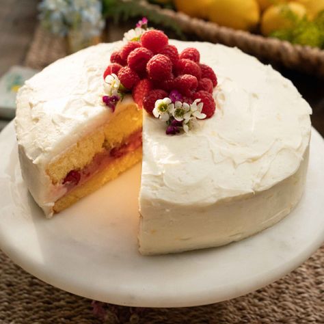 Lemon Raspberry Cake with Lemon Cream Cheese Frosting by Valerie Bertinelli Valerie Bertinelli Recipes, Lemon Coconut Cake, Lemon Raspberry Cake, Whipped Cream Cheese Frosting, Lemon Cream Cheese Frosting, Lemon Cream Cheese, Valerie Bertinelli, Cream Cheese Frosting Recipe, Raspberry Sauce