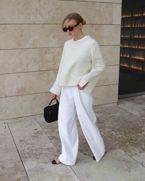 Iris | Outfit inspiration on Instagram: "White outfits hit different 🤍 Jumper: @wakakuuicons Trousers: @karen_millen * Shoes: @chanelofficial * Bag: @burkely * Sunglasses: @celine #whiteoutfit #whitetrousers #scandinavianfashion #scandifashion #beigeaesthetic #parisification #minimalistwardrobe #outfitdujour #minimalstyleblogger #theparisianchique #capsulecloset #capsulecollection #parisianamour #capsule #simplefits #autumnoutfit #everydayfashion" White Tonal Outfit, Monochromatic White Outfit, White Trousers Outfit Winter, Monochromatic Outfit White, White Monochromatic Outfit, Trousers Outfit Winter, White Monochrome Outfit, White Trousers Outfit, Sunglasses Celine