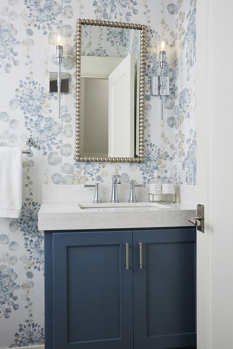 With a vibrant infusion of blues and a floral wallpaper, this renovated powder room felt bright, airy, and contemporary. Traditional Powder Room, Blue Cupboards, Colourful Interiors, 90s Decor, Powder Room Remodel, 90s Home, Powder Room Wallpaper, Renovation Tips, Blue Vanity