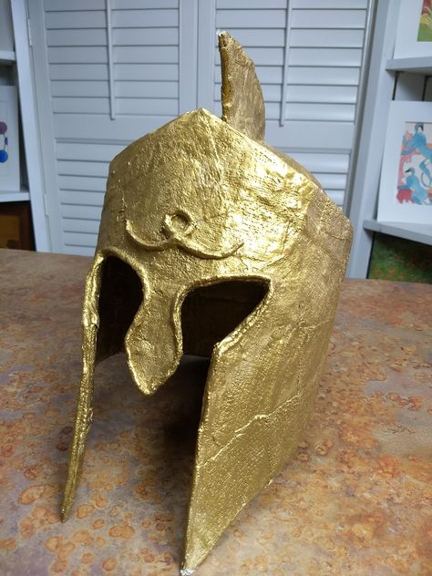 Studying Ancient Greece this year? Check out our Greek warrior's helmet. This is just one of our projects for Ancient Greece. Easy step-by-step streaming video art history that integrates with your history units. And did we mention fun?? It's time to Take Time for Art! www.taketimeforart.com #homeschoolart . #taketimeforart . #artcurriculum #homeschoolartcurriculum . #homeschooling Ancient Greece Art Projects, Ancient Greece Crafts, Ancient Greece Projects, Ancient Greece For Kids, Ancient Civilizations Projects, Art History Books, Ancient Rome Projects, Ancient Greece Art, Greek Crafts