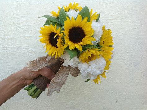 Sunflowers and white carnations wrapped in burlap ribbon. Sunflower Carnation Bouquet, Sunflower And Carnation Bouquet, White Carnation Bouquet, Carnation Wedding Bouquet, Carnation Wedding, White Carnations, Carnation Bouquet, Vowel Renewal, Sunflower Wedding Bouquet