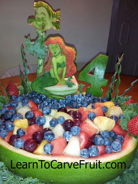 Fruit Carving, Vegetable Carving, Garnishes and Edible Arrangements: Ariel and Flounder Watermelon Carving Flounder Pumpkin, Fruits Carving, Disney Pumpkin Painting, Vegetable Flowers, Veggie Display, Fruit Creations, Ariel And Flounder, Disney Pumpkin, Watermelon Carving