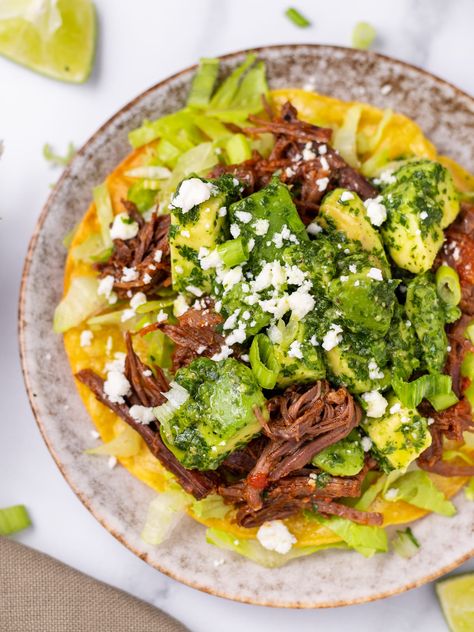 Shredded Beef Tostadas (with easy Mexican shredded beef) Shredded Beef Tostadas, Beef Tostadas, Pork Side Dishes, Avocado Chimichurri, Apartment Cooking, Mexican Shredded Beef, Freezer Recipes, Taco Dinner, Instant Gratification