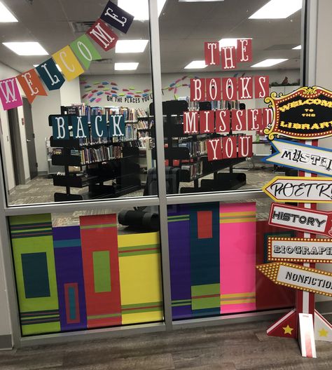 Elementary Library Wall Murals, School Library Window Decorations, School Library Desk Decor, Library Window Decorations, Library Window Displays School, Library Window Art, Library School Ideas, Elementary Library Set Up, Library Fall Decorations