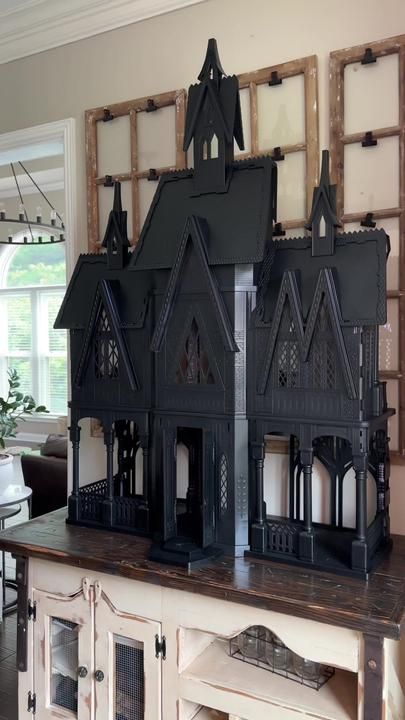 This is your sign to paint an old dollhouse black and turn it into a h... | Haunted Mansion | TikTok Diy Haunted Dollhouse Ideas, Haunted Dollhouse Diy Ideas, Halloween Haunted House Diy, Old Dollhouse, Haunted Mansion Decor, Halloween Dollhouse, Haunted House Diy, Classy Halloween Decor, Dollhouse Halloween