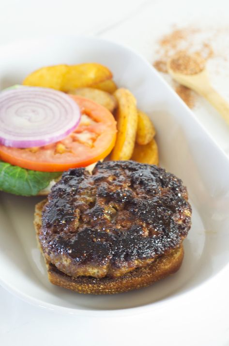 White platter with a black and blue burger on a bun with lettuce, tomato and onion and a side of fries. Burger Accompaniments, Black And Blue Burger, Blue Burger, Blackening Seasoning, Cheese Buns, Cheese Crust, Red Onion Salad, Burger Buns, Everyday Meals