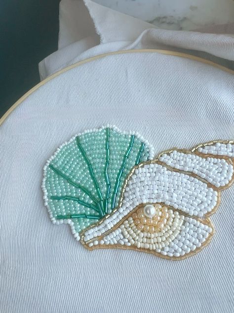 Bead embroidery, seashell bead embroidery, bead embroidered seashell Shell Bead Embroidery, Easy Bead Embroidery, Easy Beaded Embroidery, Embroidery Beads Tshirt, Bead Embroidery Tshirt, Bead Embroidery Ideas, Embroidery Shells, Shell Tshirt, Embroidered Seashell