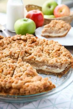 Apple Streusel Cheesecake Pie combines two dessert favorites with a graham cracker crust, creamy cheesecake layer, homemade apple pie filling, and crunchy streusel topping. Apple Pie With Graham Cracker Crust, Cream Cheese Apple Pie Recipe, Apple Streusel Cheesecake, Dessert Favorites, Apple Pie Cheesecake, Graham Cracker Recipes, Cheesecake Layer, Homemade Graham Cracker Crust, Homemade Apple Pie Filling