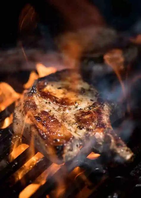 Lemon Garlic Marinated Grilled Pork Chops on the barbecue being licked by flames. Marinated Pork Chops Grilled, Pork Chops Bone In, Marinated Pork Chops, Bbq Pork Ribs, Bbq Shrimp, Pork Rib Recipes, Recipetin Eats, Propane Grill, Grilled Pork Chops