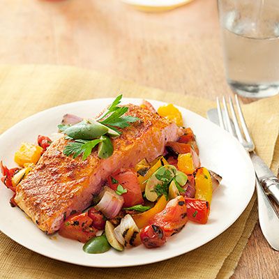 Smoky Spanish paprika gives your salmon and grilled vegetables an exotic kick. #protein #vegetables #myplate Summer Tomato Recipe, Summer Tomato, Healthy Fish, Salmon Recipe, Oil Company, Tomato Recipes, Baked Salmon, Grilled Vegetables, Good Housekeeping