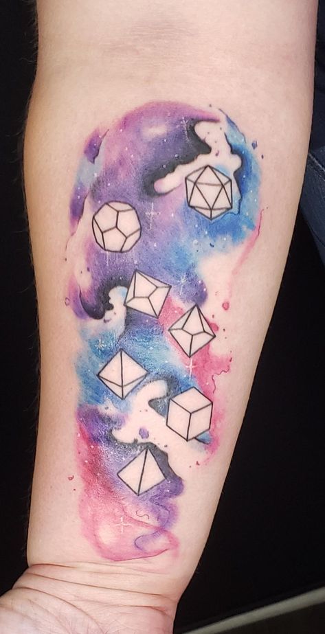 Polyhedral Galaxy watercolor by Brad Yow at Canvas Tattoo Charlotte NC. Picture taken immediately after. #tattoos #tattoo #beauty Polyhedral Dice Tattoo, Dnd Tattoo Ideas, Dnd Tattoos, D20 Tattoo, Math Tattoo, Dice Tattoos, Galaxy Sleeve, Dnd Tattoo, Geeky Tattoos