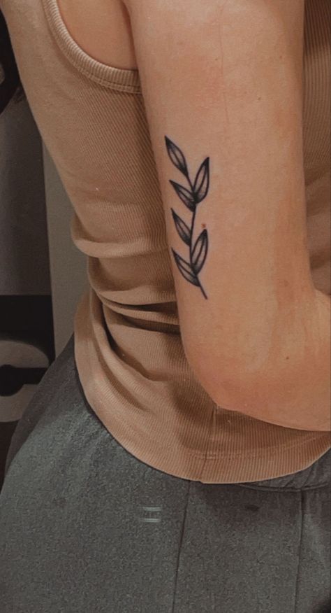 Back of arm olive branch/leaf tattoo Olive Branch Tattoo Back Of Arm, Olive Branch Arm Tattoo, Leaf Tattoo Placement, Leaf Line Tattoo, Inside Of Arm Tattoo Women, Small Branch Tattoo, Back Of Upper Arm Tattoo Women, Arm Leaf Tattoo, Olive Leaves Tattoo