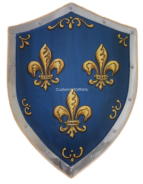 Crusader meatl shield with Fleur-de-lis - gold on antique blue For more info, pricing and to purchase please visit our website Knights Shield, Painted Shield, Templar Shield, Family Tree Artwork, Heater Shield, Shield Medieval, Medieval Home Decor, Medieval Shield, Crest Shield