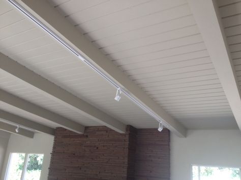 White beams, track lighting Track Lighting Office, White Beams Ceiling, Lighting Ideas Bedroom, Track Lighting Ideas, White Track Lighting, Vaulted Ceiling Lighting, Lighting Office, Attic Closet, Attic Playroom