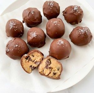 Healthy Chocolate Covered Cookie Dough Balls Cookie Dough Protein Balls, Chocolate Covered Cookie Dough, Cookie Dough Protein, Food Change, Chocolate Covered Cookies, Cookie Dough Balls, Protein Balls, Dough Balls, Chocolate Coating