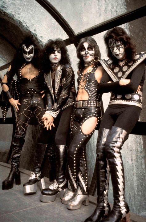 KISS - An American rock band formed in New York City in January 1973. Well known for its members' black and white face paint and flamboyant stage outfits, the group rose to prominence in the mid to late 1970s with their elaborate live performances, which featured fire breathing, blood spitting, smoking guitars, shooting rockets, levitating drum kits and pyrotechnics. Starchild (Stanley), The Demon (Simmons), Spaceman or Space Ace (Frehley) and Catman (Criss). Band Kiss, Eric Singer, Rock & Roll, Peter Criss, Vintage Kiss, Kiss Army, Kiss Pictures, Black And White Face, Ace Frehley