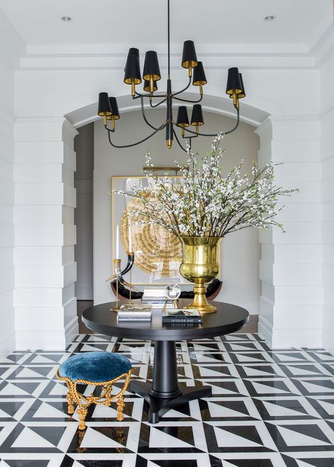 House Tour: In Orem, Traditional Design Gets a Fresh Twist in a Stunning Family Home Round Foyer, Round Foyer Table, White Foyer, Arched Doorway, Utah Style, Alice Lane Home, Alice Lane, Large Chandelier, Foyer Table