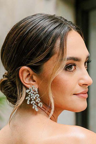 For brides currently searching for jewelry, here's a guide on how to choose the best pair of earrings for your wedding dress and hairstyle, according to an expert. Small Drop Earrings, Popular Earrings, Most Beautiful Wedding Dresses, Types Of Earrings, Bold Necklace, Chunky Earrings, 2024 Style, Chandelier Style, Dress Out