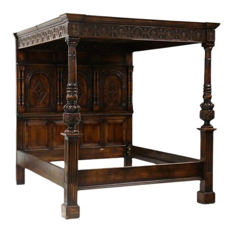 This bed is an absolute stunner. It is reminiscent of a Tudor style bed one would have found centuries ago in a castle.  It is definitely fit for a king or queen!  The bed is constructed from walnut and has secondary, multi-part form, raised panel canopy with applied cove molded edge, paneled headboard with fully turned columns and foliate relief carving, footboard consists of two fully turned and relief turned columns, with rails. The carvings are ornate and just stunning. The bed is of solid a Brass Canopy Bed, Medieval Bedroom Ideas, Edwardian Bed, Four Poster Bed Ideas, Victorian Bed Frame, Gothic Canopy Bed, Old World Bedroom, Antique Canopy Bed, Enclosed Bed