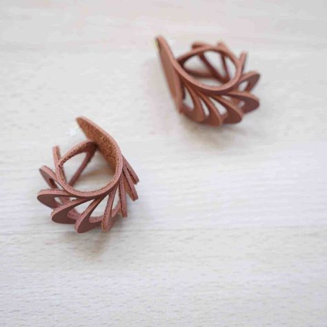 DIY Sculptured 3D Leather Earrings - DOMESTIC HEIGHTS Unique Handmade Jewelry Leather, Leather Earring Shapes, Leather Earrings Shapes, 3d Leather Earrings, Embossed Leather Earrings, Leather Earrings Cricut, Leather Bracelet Diy, Leather Sculpture, Sculptural Earrings