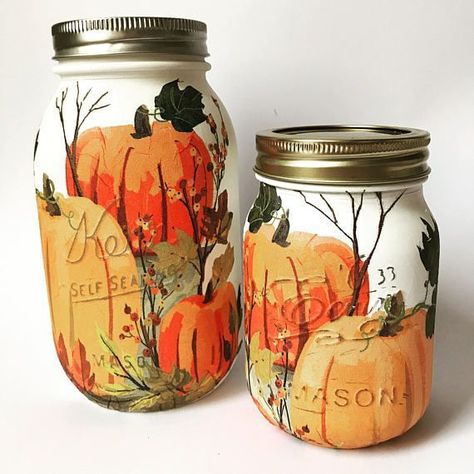 Hand Painted Fall Pumpkin Mason Jars from Natysha's Vintage Home. If painted pumpkins aren't really your style, how about pumpkin painted mason jars? These hand painted mason jars are painted with chalk paint, decoupaged and then sealed using finishing wax. Pop in a solar light and watch them glow! Fall Mason Jar Crafts, Fall Mason Jars, Diy Hanging Shelves, Halloween Pumpkins Painted, Adornos Halloween, Wine Bottle Diy Crafts, Mason Jar Crafts Diy, Wine Bottle Diy, Mason Jar Lighting