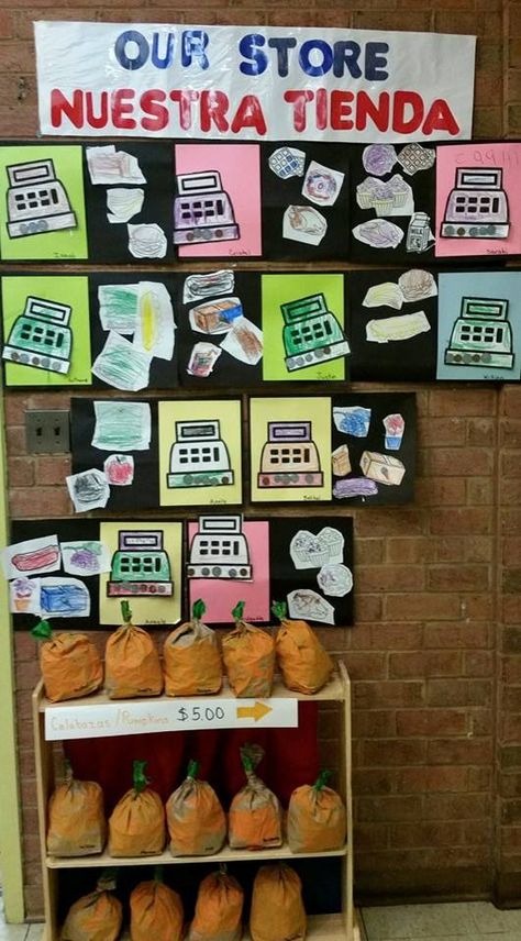 Check out our Grocery Themed bulletin board! Our students had fun sorting coins and gluing them to the register. Next they selected foods they wanted to purchase and glued them to the conveyer belt. Last we decided to have a featured store item on display. The students made pumpkins by filling bags with recycled paper and painting them. "Pumpkins for sale! $5.00!" A little expensive. They must be organic! Lol. They enjoyed selling them during center time.  Like me on Facebook - TakeOutTeacher Grocery Store Dramatic Play, Conveyer Belt, Pumpkins For Sale, Dramatic Play, Take Out, Bulletin Boards, On Display, Bulletin Board, Preschool Activities