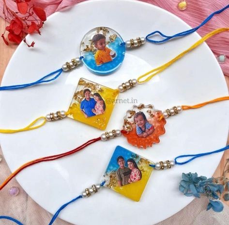 Handmade Rakhi it can be personalized with photo and name. Why not make it a special one this year with a premium quality Rakhi for your special brother. After placing the order , you will have to send us your picture on charmipatel2023@ gmail.com. Photo Rakhi, Resin Photo, Rakhi Making, Rakhi For Brother, Handmade Rakhi, Rakhi Design, Personalized Jewelry Box, Photo Keychain, Mehndi Designs For Beginners