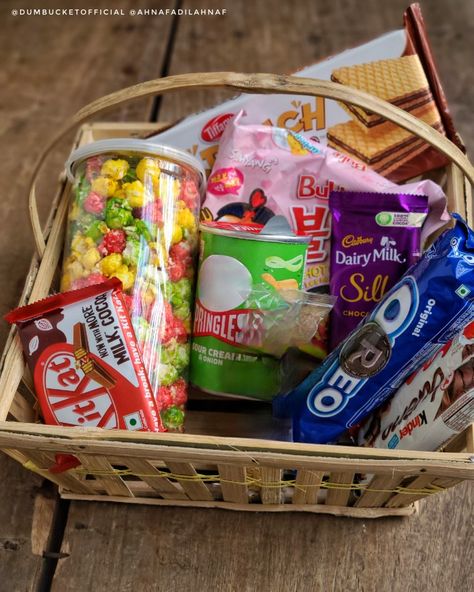 Customized Gift Basket delivery from today • 1 Ramen • 1 Large Rainbow Popcorn • 1 Ferrero Rocher • 1 Kinder Bueno • 1 Pringles Sour Cream & Onion • 1 Kitkat • 1 Oreo Vanilla • 1 Tiffany Chocolate Wafers • 1 Dairy Milk Silk Inbox us to get a customized basket catered just for you! 24-48h home delivery available inside Chattogram. Shipping all over the country through Qurrier also😊 #giftbasket #gift #basket #bamboo #bamboobasket #assortedbasket #dumbucketofficial #ahnafadilahnaf Rainbow Popcorn, Dairy Milk Silk, Cadbury Dairy Milk, Chocolate Wafers, Bamboo Basket, Sour Cream And Onion, Ferrero Rocher, Dairy Milk, Milk Silk