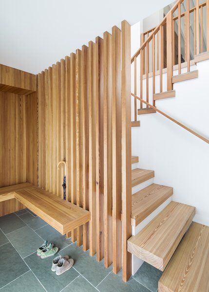 Staircase, Wood Tread, and Wood Railing Entry bench, screen and stair Photo 1 of 28118 in Best Photos from Deertrack Lane Open Basement Stairs, Wooden Staircase Design, Open Basement, Basement Stairs Ideas, Wooden Staircase, Wood Railing, Open Staircase, Stair Case, Basement Stairs