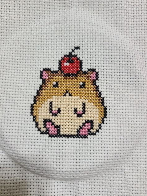 Just a cross stitch of a hamster with a cherry on his head Small Animal Cross Stitch, Skzoo Cross Stitch Pattern, Small Kawaii Cross Stitch, Hamster Embroidery, Rat Cross Stitch, Hamster Cross Stitch, Hamster Cross Stitch Pattern, Embroider Ideas, Kawaii Faces