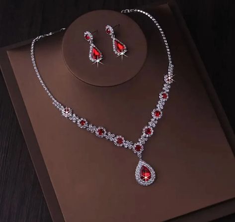 Holiday Special!!! Chic Silver Plated  Necklace & Earrings  Red Rhinestone Crystal Sets Stunning Necklace and Earrings Set Necklace & Earrings Modern Design Set / 287 Red Clear Color - Silver Plated Alloy Brand new  MSRP of this set is $89.00 Buy now before it's gone. You can't go wrong with this elegant set. The upscale craftsmanship and quality. Set is brand new with tag. Prom Dress Accessories Jewelry, Red And Gold Necklace, Red Prom Jewelry, Red And Silver Jewelry, Red Jewellery Set, Necklace With Red Stone, Garnet Jewelry Set, Red Choker Necklace, Red Jewelry Set