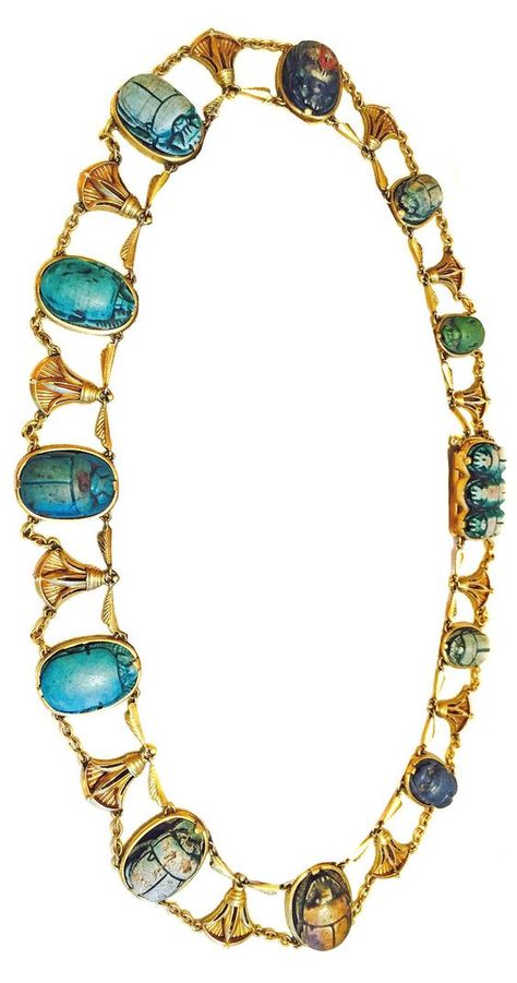 An Egyptian Revival gold and antique steatite scarab necklace, R.H. Blanchard, Cairo, circa 1900. Set with antique scarabs from 1,500 B.C. - 966 B.C. Original certificate with description of each scarab. #Blanchard #EgyptianRevival #necklace Egyptian Revival Jewelry, Egypt Jewelry, Ancient Egyptian Jewelry, Bijoux Art Nouveau, Ancient Jewellery, High Jewellery, Long Pearl Necklaces, Historical Jewellery, Insect Jewelry