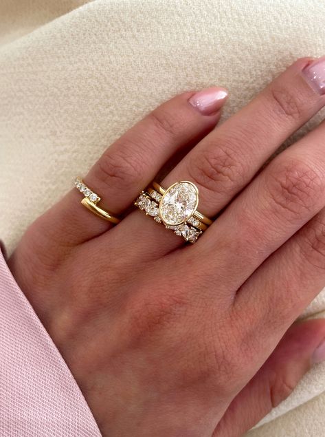 The ring stack inspo you didn't know you needed🤩  This is the perfect example of how you can mix and match stone shapes in your ring stack! ✨️  The Lana wedding ring features marquise and round-cut stones, the Peggy wedding ring features round stones, and the Sage engagement ring features an Oval.  We're literally obsessed💍 Triple Stack Wedding Ring, Oval Solitaire Wedding Stack, Oval Bezel Engagement Ring Stack, Round Ring Stack, Oval Engagement Ring Stack Silver, Big Round Engagement Ring, Oval Wedding Stack, Bezel Ring Stack, Bezel Engagement Ring Stack