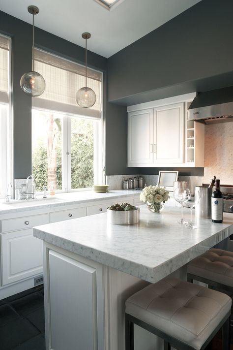 Kitchen Design from Kishani Perera  Simple, clean, pretty SO CHIC! Love the lighting!  Read more - http://www.stylemepretty.com/living/2013/08/06/kitchen-design-from-kishani-perera/ Grey Kitchen Walls, Серая Кухня, Grey Kitchen Designs, Dark Grey Kitchen, Dark Grey Walls, Gray And White Kitchen, Kabinet Dapur, Kitchen Wall Colors, Kitchen Design Modern White