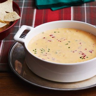 Christmas Queso by Ree Drummond Christmas Queso Pioneer Woman, Pioneer Woman Christmas Queso, Christmas Queso Dip, Christmas Queso, Velveeta Queso, Ree Drummond Recipes, Christmas Cocktail Party, Queso Recipe, Queso Dip