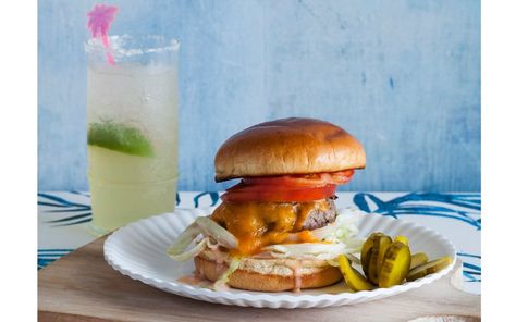 Celebrate National Cheeseburger Day With Jimmy Buffett's Original Cheeseburger in Paradise Recipe National Cheeseburger Day, Cheeseburger In Paradise, Pillsbury Cinnamon Rolls, Burger Dogs, Cheese Burger, Jimmy Buffett, Delicious Burgers, Burger Buns, Chef Recipes