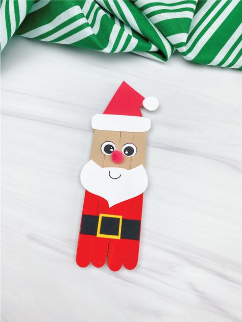 Use popsicle sticks to create your very own DIY Popsicle Stick Santa craft. It's an easy Christmas tutorial for kids! It comes with a free template, too. Popsicle Stick Rainbow, Christmas Crafts Simple, Stick Fairy, Santa Activity, Popsicle Craft, Popsicle Stick Christmas Crafts, Santa Claus Crafts, Stick Christmas Tree, Santa Template