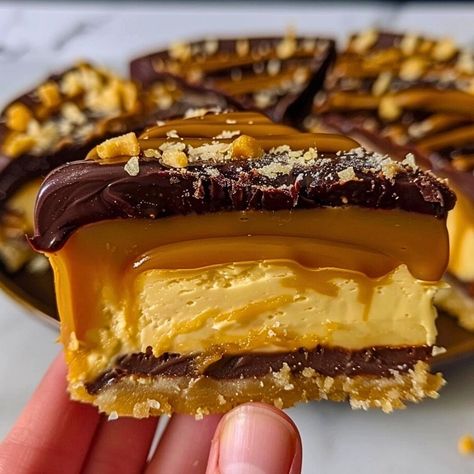 Homemade No-Bake Twix Cheesecake Twix Cheesecake Recipe No Bake, No-bake Twix Cheesecake, Twix Cheesecake Bars, Twix No Bake Cheesecake, Twix Cheesecake No Bake, No Bake Twix Cheesecake Recipes, Twix Dessert Recipes, Twix Dessert, Twix Cheesecake Recipe