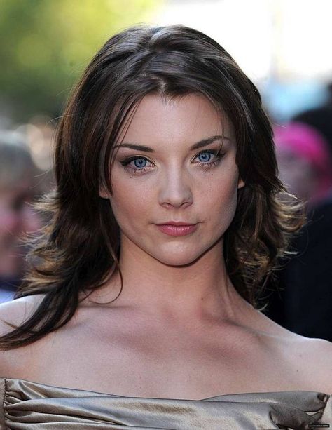 Natalie Dormer (born 11 February 1982) is an English actress. She is known for her roles as Anne Boleyn in the Showtime series 'The Tudors', Irene Adler in 'Elementary', and Margaery Tyrell in the HBO series' Game of Thrones'. She also played Cressida in the science fiction adventure films 'The Hung Natalie Dormer, Blue Eyes, Blue