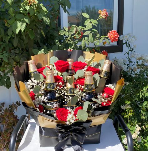 Beer And Rose Bouquet 🌹✨ These have become a Popular Order & I am not mad about it! 🖤🍺 We can customize this to include any drink of your choice. They are also a great display piece as well even after removing the drinks🤍 perfect gift for any occasion ✨ #beerstagram #beerbouquet #beerarrangement #modelo #cerveza #giftsforhim #parael #floresnaturais Beer Bouquet, Rose Bouquet, Gifts For Him, Beer, Perfect Gift, Drinks, Canning, Gifts, Quick Saves