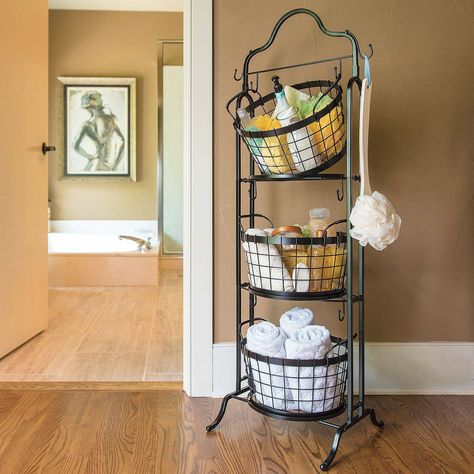 Smart and Chic Bathroom Towel Storage Ideas [10 Options!] Wire Basket Decor Bathroom, Bathroom Towel Storage Ideas, Wire Basket Decor, Tiered Basket Stand, Guest Basket, Bath Towel Storage, Bathroom Towel Storage, Towel Basket, Bathroom Stand