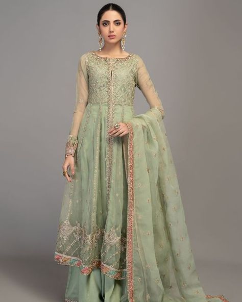 Imani Studio on Instagram: "Pastel Green Organza Fully Embroidered front open frock Paired with matching Cotton Satin short undershirt (Link in Bio) #imanistudio #mariab #embroidered #partywear #eventwear #organza #cottonstin" Organza Frocks, Suit Green, Satin Trousers, Maria B, Satin Short, Ready To Wear Collection, Suit Fabric, Indian Fashion Dresses, Pakistani Outfits