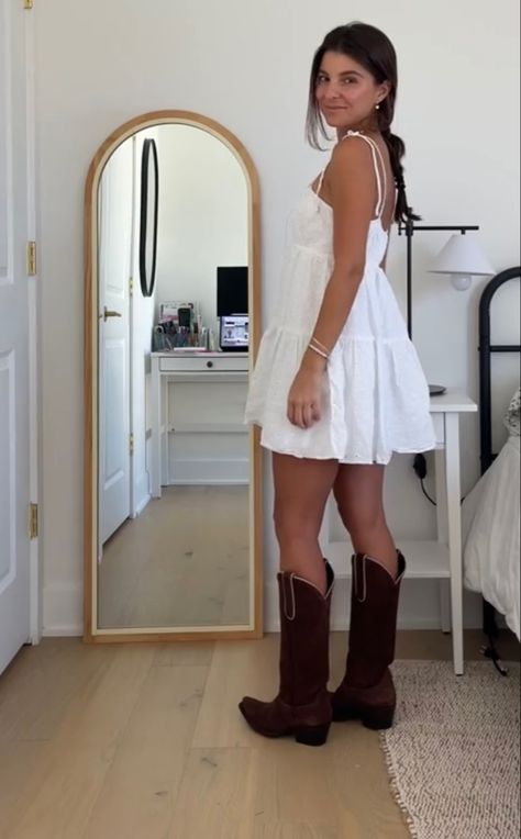 Cowgirl White Dress Outfit, White Flowy Dress With Cowgirl Boots, White Dress With Brown Boots, Dresses With Brown Cowboy Boots, White Mini Dress With Cowboy Boots, Coastal Cowgirl White Dress, Sundress And Cowgirl Boots, Summer Dress Cowboy Boots, White Dress Country Concert