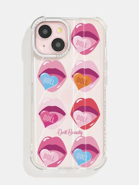 Blow kisses through your phone with this protective holo case made with Dolls Beauty!  This case is part of our print-to-order range. With print-to-order phone cases we print them as you purchase, which is a much more sustainable method of production – ultimately meaning we waste less plastic because less plastic is fantastic 😉 Add one of our Glass Screen Protectors on with this case and get it half price! (Discount automatically applied at checkout). Shock absorbent iPhone case  Holo base design Anti-slip dotted grip edges Anti-shock bumper corners Logo debossed in chrome camera ring for enhanced protection Raised edges give added protection to your screen face Scratch-resistant Drop tested Covers back and sides of phone Access to all ports with cutaway detailing Slim & lightweight desig Uk Makeup, Doll Beauty, Skinnydip London, London Brands, Base Design, Half Price, Mini Case, Glass Screen, Screen Protectors