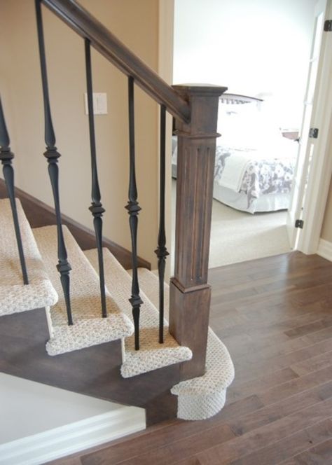 Carpet Grade stairs, wood rail and newel, metal spindles Stair Post Ideas Wood, Carpet Stairs With Iron Spindles, Stair Railing Ideas With Carpet, Stair Railing With Carpet, Stairs With Metal Spindles, Cabin Stairway, Wood And Metal Stair Railing, Spindles Stairs, Metal Spindles Staircase