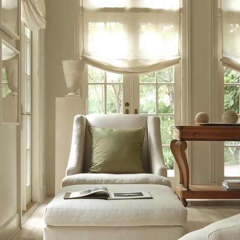 Betsy Brown Interior Design on Instagram: “Soft afternoon light for our most serene client. #betsybrowninc” Sitting Corner, Sheer Roman Shades, Brown Interiors, Windows Curtains, Linen Roman Shades, Relaxed Roman Shade, Types Of Window Treatments, Sheer Shades, Chair Ottoman