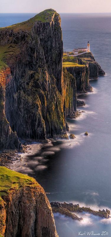 Neist Point is one of the most famous lighthouses in Scotland and can be found on the most westerly tip of Skye near the township of Glendale. While the walk down is an easy one, the concrete path does get quite steep at times. From the path you will see stunning views of the high cliffs and the lighthouse itself, at sunset the view is made even more spectacular making this a top destination for landscape photographers. Neist Point, Magic Places, Isle Of Skye Scotland, Skye Scotland, The Cliff, Voyage Europe, The Lighthouse, Isle Of Skye, Scotland Travel