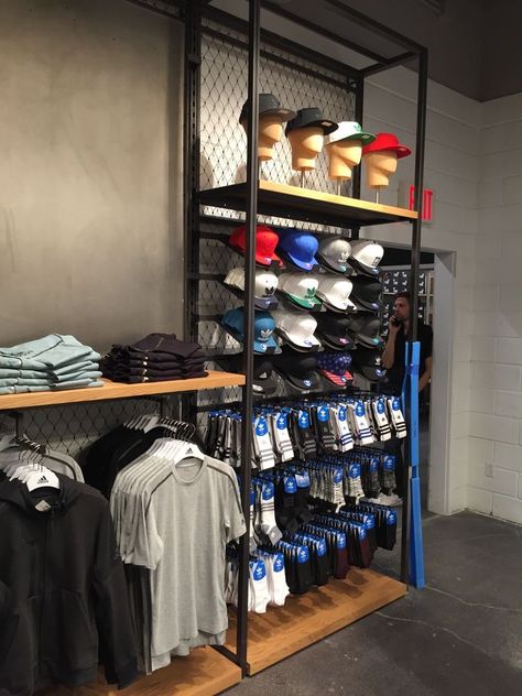 Sports Store Display, Adidas Store Interior, Sports Store Interior, Sports Retail Store Design, Gym Retail Display, Sports Display Ideas, Adidas Store Design, Sport Shop Design, Clothing Retail Store Design